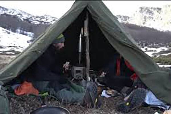 Is it safe to sleep in a tent with a wood burning tent stove?