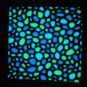 Photoluminescent glazed tile