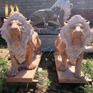 Hand carved marble lion from a beautiful pink marble for sale