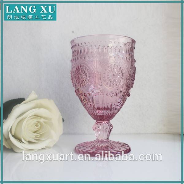 purple colored juice water goblet glass