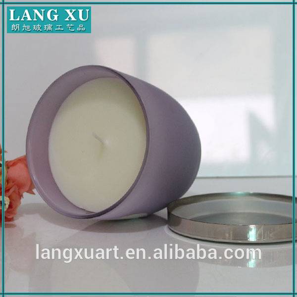 Luxury scented candle in matte color glass jar with metal lid