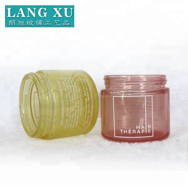 LXHY-B124 wholesale red and yellow colored glass cosmetic cream empty jar with customized logo