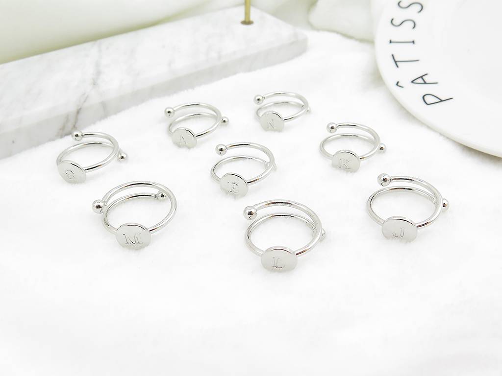 silver circular letter opening rings