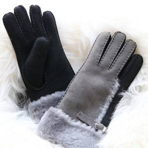 Ladies genuine lamb skin gloves with wool out trim