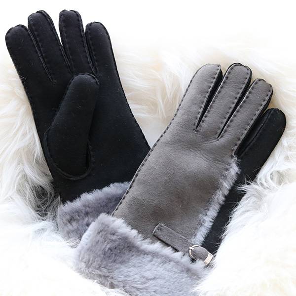 Ladies genuine lamb skin gloves with wool out trim Featured Image