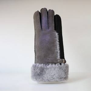 Ladies genuine lamb skin gloves with wool out trim