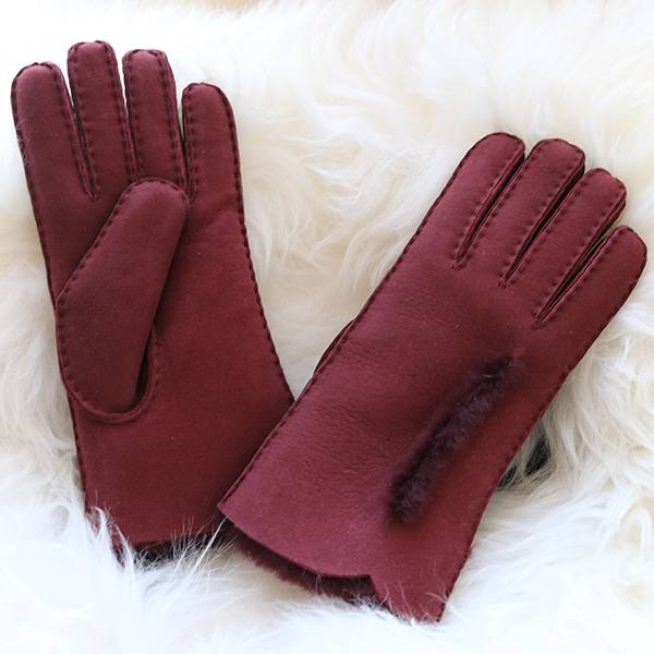 handsewn merino sheepskin ladies gloves with waving cuff and wool out trim Featured Image