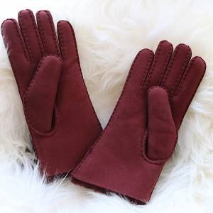 handsewn merino sheepskin ladies gloves with waving cuff and wool out trim