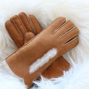 handsewn merino sheepskin ladies gloves with waving cuff and wool out trim