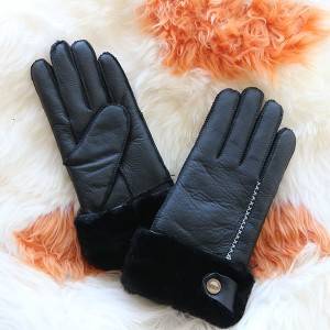Patches/Pieces napa sheepskin gloves feature a buckle