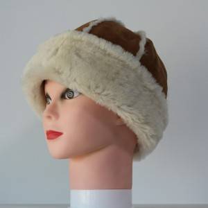 ladies luxury sheepskin hats with wool out trim detail