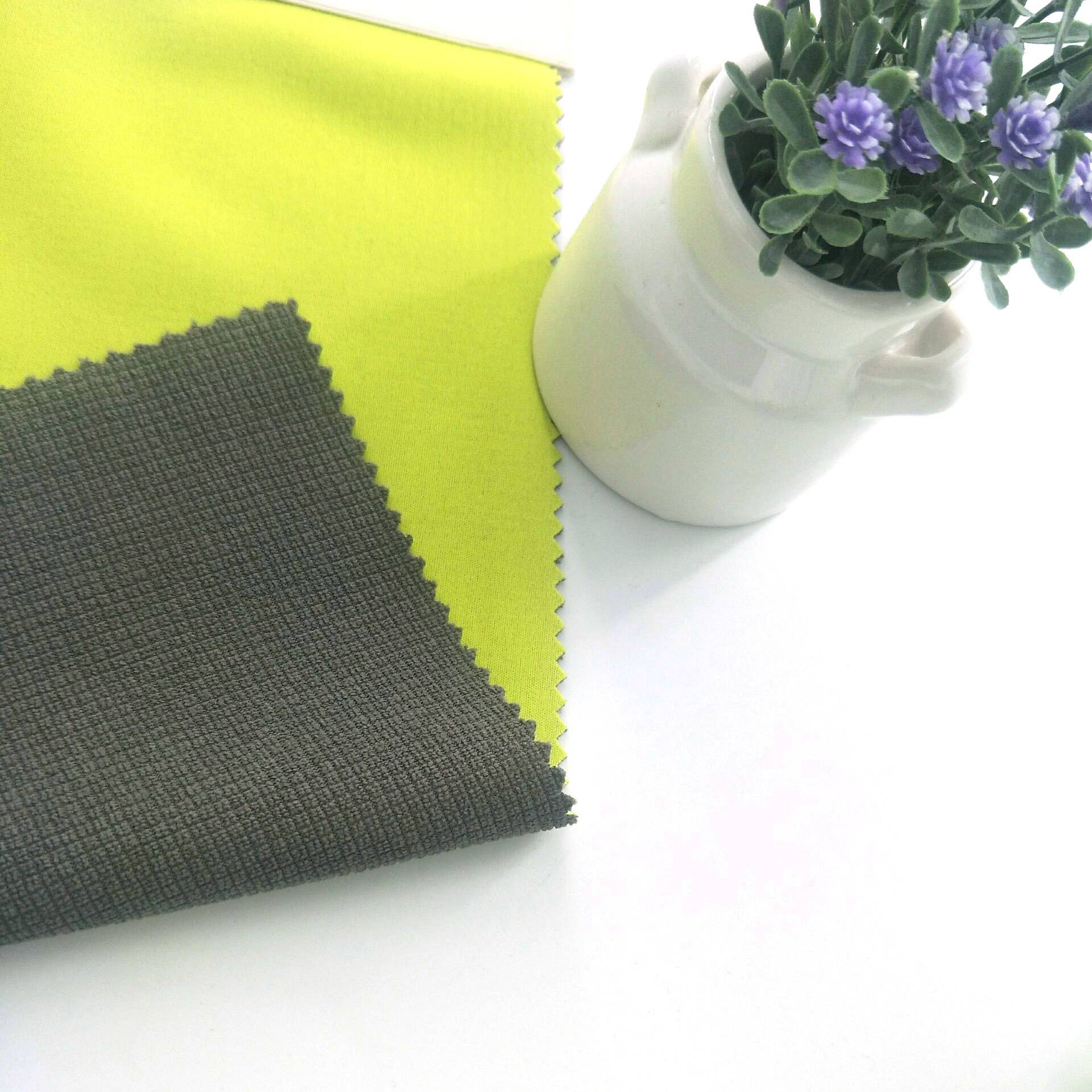top selling 100% polyester interlock fabric bonded film bonded grid fleece for sportswear