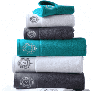 china wholesale stock 100% cotton jacaquard face towel set embroider LOGO
